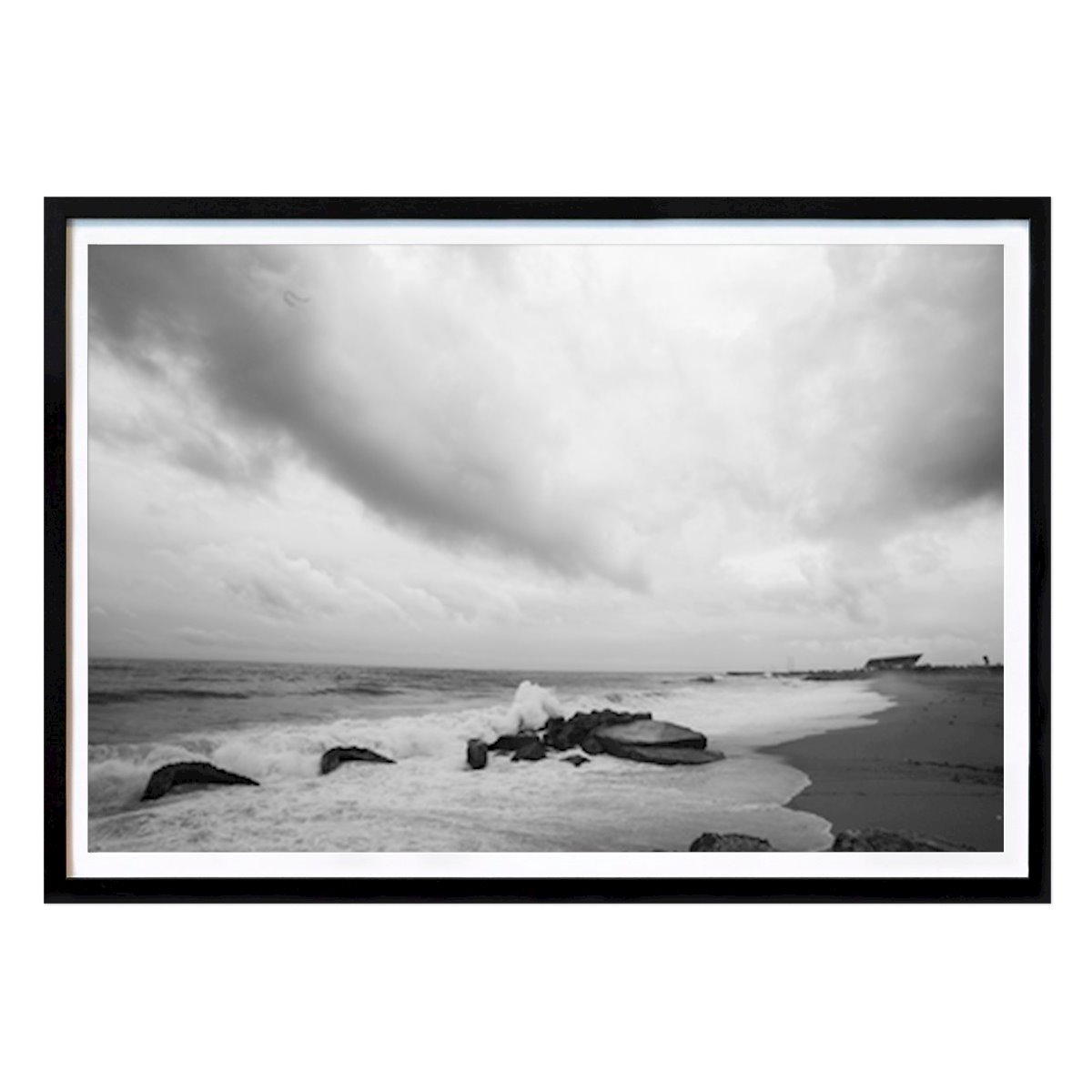 Black & White Poster: Stormy Serenity: A Black and White Coastal Landscape in Barcelona by Örjan Fredriksson